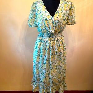NSR green floral dress in size medium.